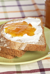 Toast with jam with soft shadow on background. Shallow DOF