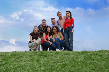 A group of friends against sky