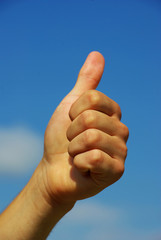 hand with thumb up ok signal