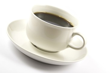 A cup filled with strong black hot coffee
