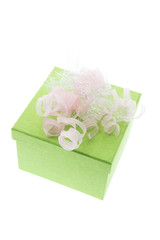 Fototapeta na wymiar Green Gift Box with Curling Ribbon on White Background
