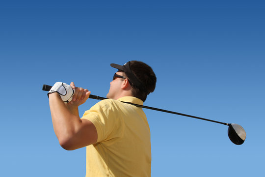 Golfschwung - Golfer beim Abschlag