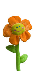 Smiling flower toy on white background