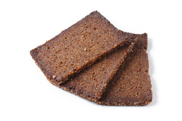 Slices of pumpernickel bread, isolated on white
