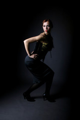 retro portrait of beautiful mysterious girl i the dark