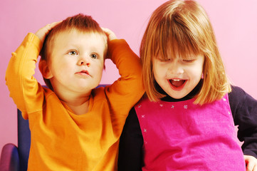 A little happy boy and girl