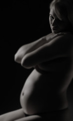 A tummy of pregnant woman