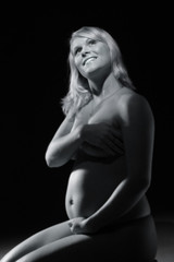 A tummy of pregnant woman