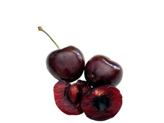 isolated halved cherries  with pit and stem