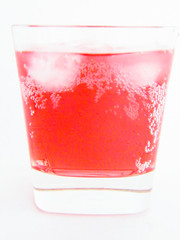 Glass with juice and ice