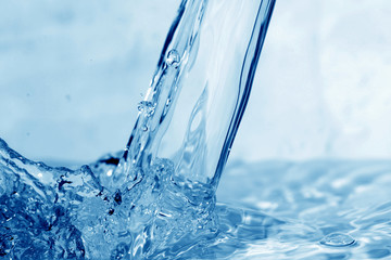 Fototapeta na wymiar water wet splash macro close up