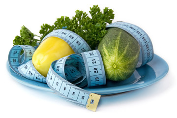 a fhoto of fresh cucumber and paprika on plate © koshkina