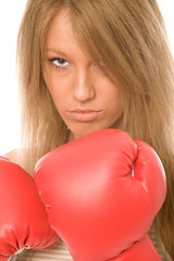 girl with red boxing gloves on a white background