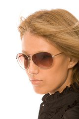 young woman in sunglasses on a white background