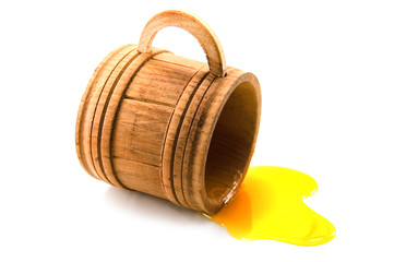 honey on wood cup isolated