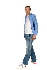 young man in trendy jeans and oxford shirt