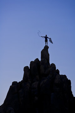 Rock climber on the summit.