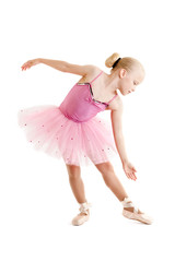 Young ballerina dancer over a white background