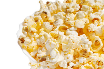 Salty popcorn in plate with copy space