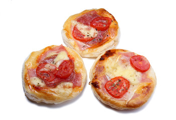Salt pizza cake with tomato and salami bitten
