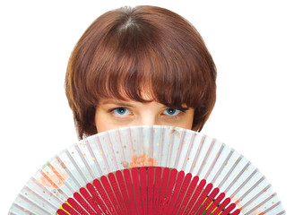 Happy young girl with fan over white