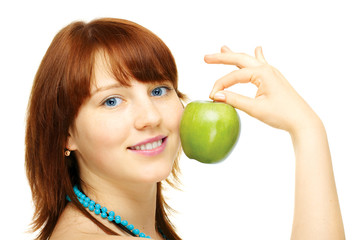 Happy young girl with apple over white