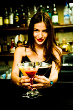 A Young Female Bartender, Photographed At Work.