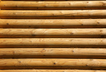 Wall of the rural house from wooden logs
