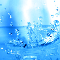 Fototapeta na wymiar blue water splash macro close up