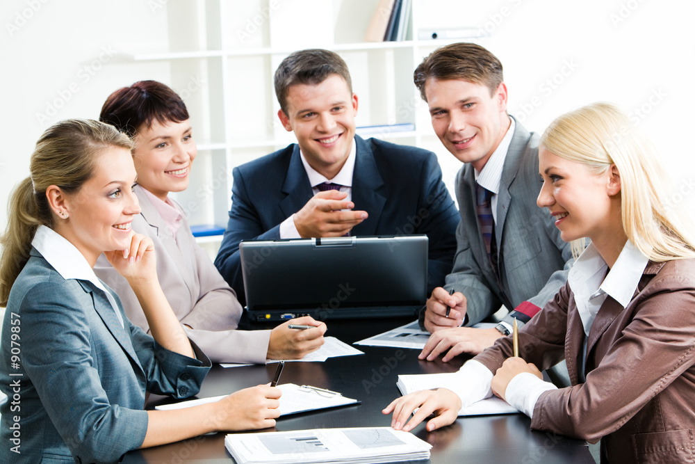 Wall mural photo of business group sitting at workplace