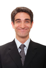 Businessman in dark suit smiling