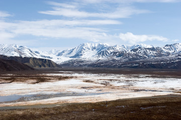 Snow melting on mountains in Alaska