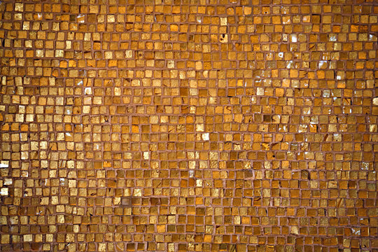 old golden mosaic floor background in romanian monastery