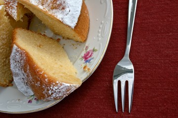 Cake on a plate with pastry fork