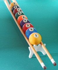 billiards ball on a billiards stick