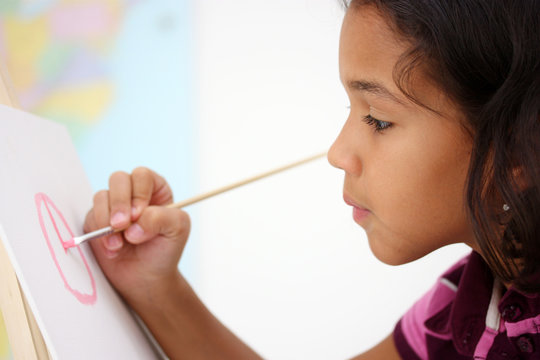 Art Student In A Classroom At School