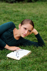 Student Reading in a public park