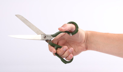 Scissors in a hand