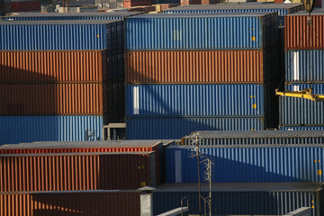 Cargo containers are overloaded in sea port