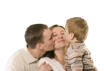 Happy young family. Isolated over white
