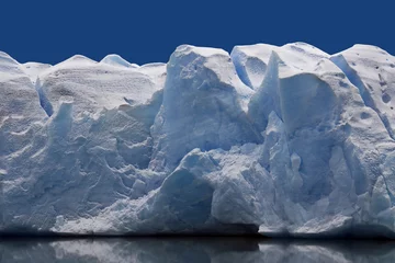 Fotobehang Gletsjers Blauw ijs op de grijze gletsjer