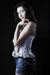 Fototapeta premium Young beautiful woman with long dark hair