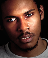 Beautiful Image of a young Black man crying