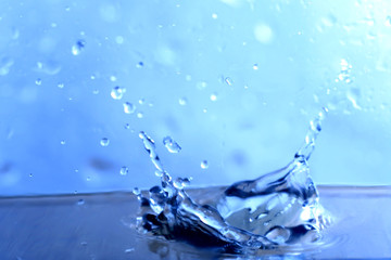 Fototapeta na wymiar great blue water splash close up macro