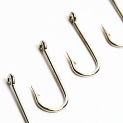 fishing hooks macro close up on white