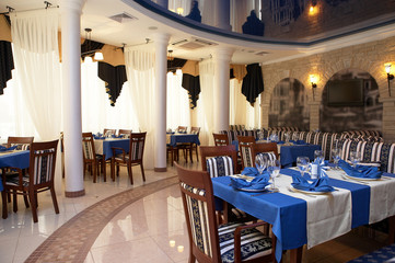 Beautiful modern restaurant with a mirror ceiling