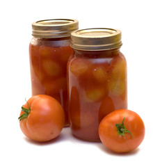 Tomatoes canned in mason jars to keep as preserves