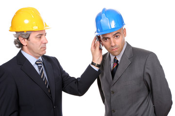Two Engineers or Architects, on the phone, isolated in white