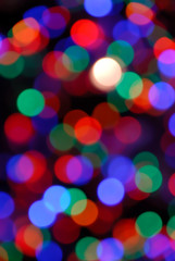 Abstract Out of Focus Christmas Lights on Outdoor Tree