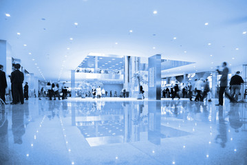 people in hall of business center